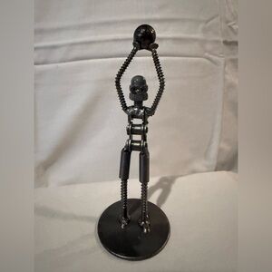 Metal Sculpture Art Piece Metal Basketball Player Ball Overhead Forward Facing